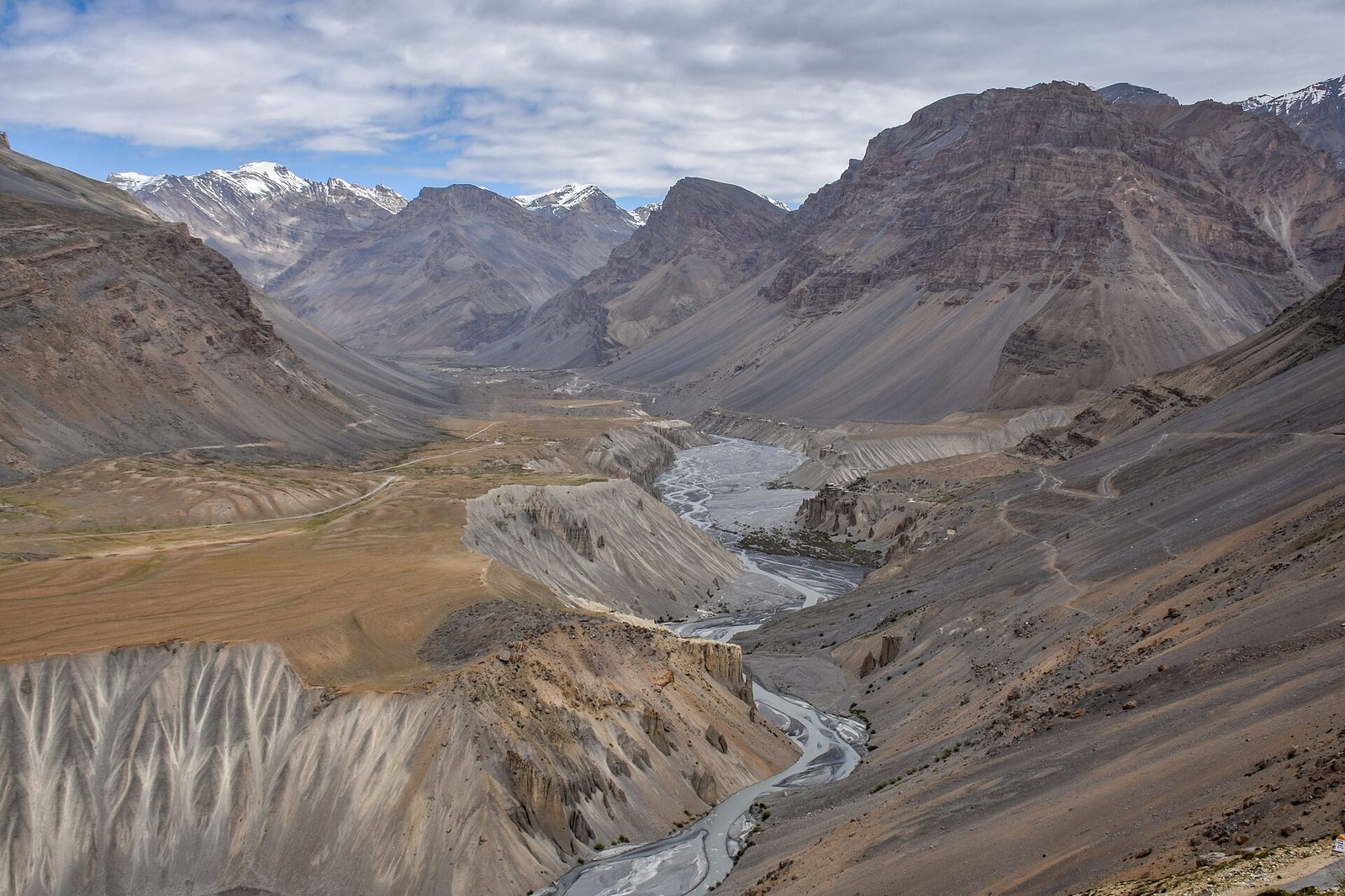 Mountain highway winding through the Spiti Valley between Kaza and Losar
